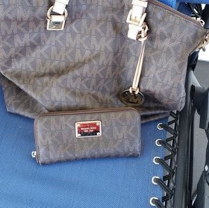 Michael Kors brown shoulder back and wallet.